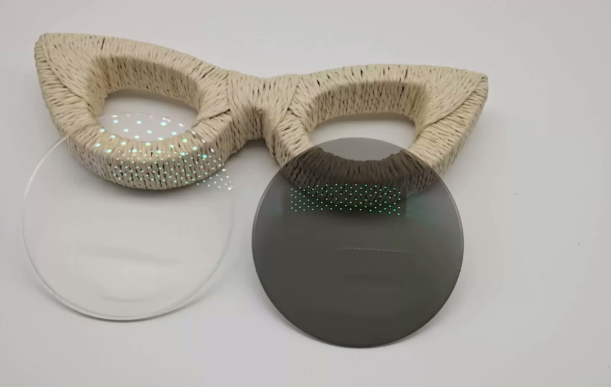 Bifocal photochromic lens sample with clear and tinted lens comparison