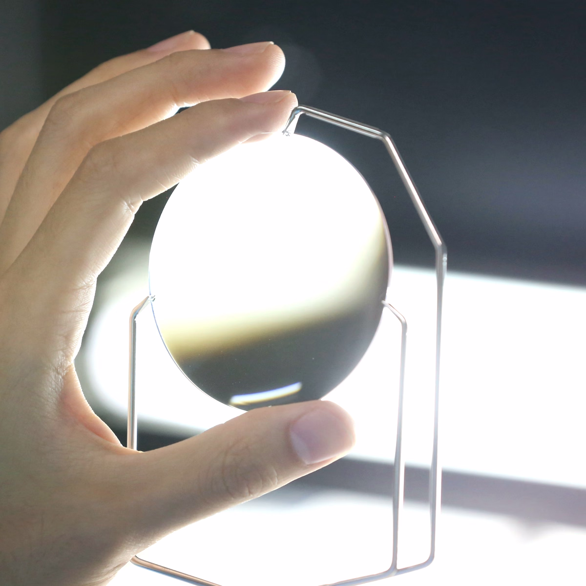 Spin photochromic lens production and coating process
