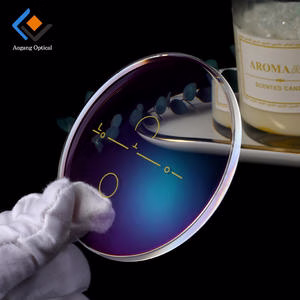Round top bifocal lenses with near vision segment for optical programs